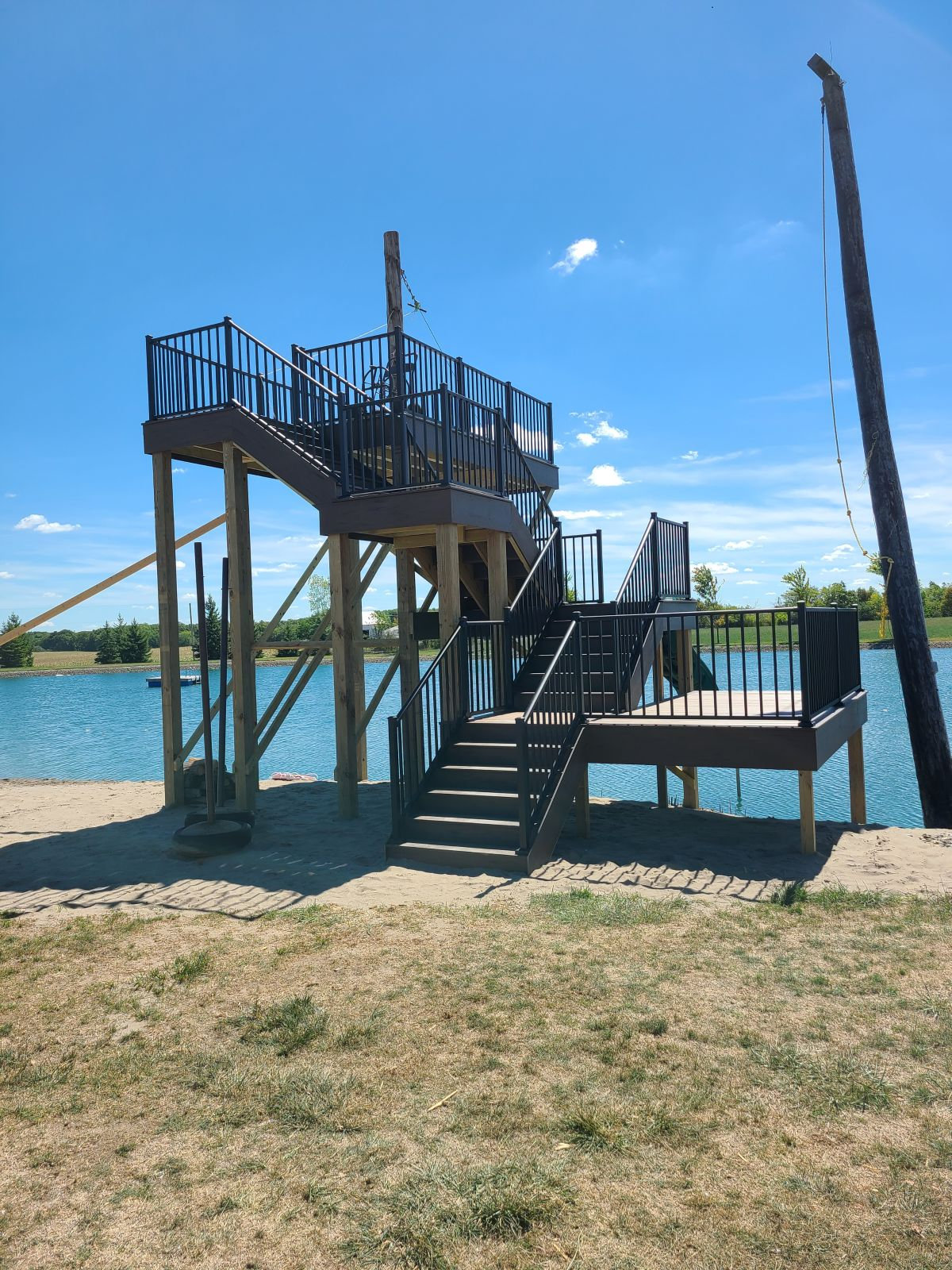 Custom multi level lakeside deck and platform built on the waterfront
